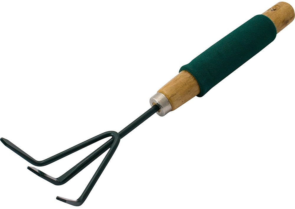 Close-up of a Marksman Hand Cultivator With Foam Handle featuring a wooden design and green rubber grip. This essential gardening tool comes with a small metal head equipped with three curved prongs for soil loosening and cultivation. The hand cultivator is positioned diagonally on a white background.