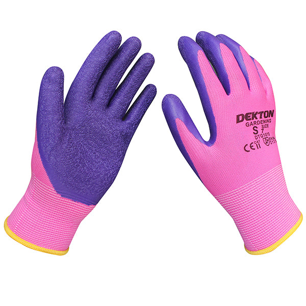 A pair of Dekton Tough Grip Latex Coated Gardening Gloves in size 7/Small featuring pink cuffs and hand sections, with purple palms and fingers. The ultra grip design includes the DEKTON brand name printed on the back along with size details and certification marks.