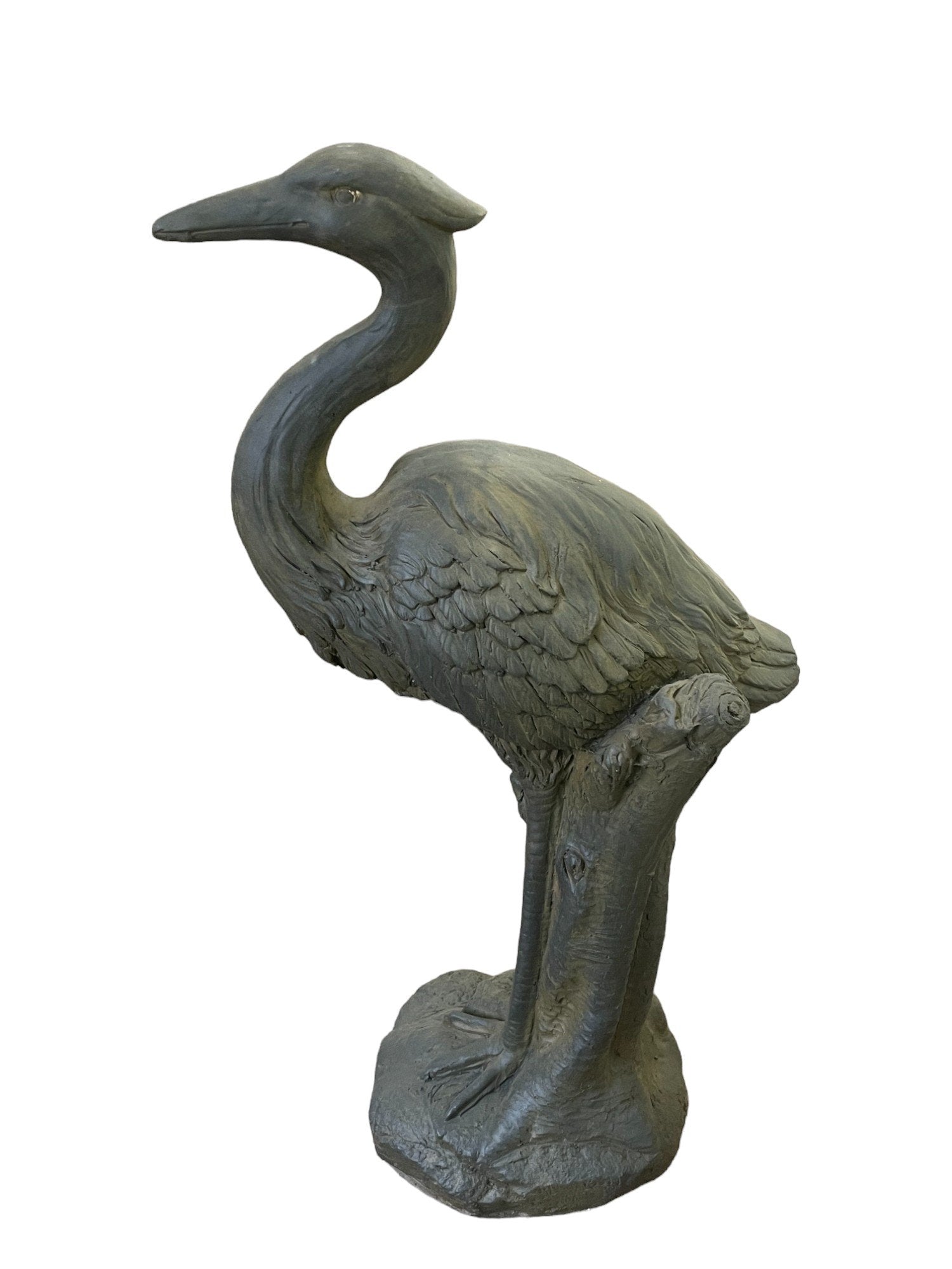 The Stone Effect Grey Heron Statue stands gracefully on a base, detailed with intricate feathers and one foot supported by a tree branch. Perfect for garden decor, the heron curves its neck and extends its beak in an elegant pose. Ideal for an outdoor display, it contrasts beautifully against the white background.