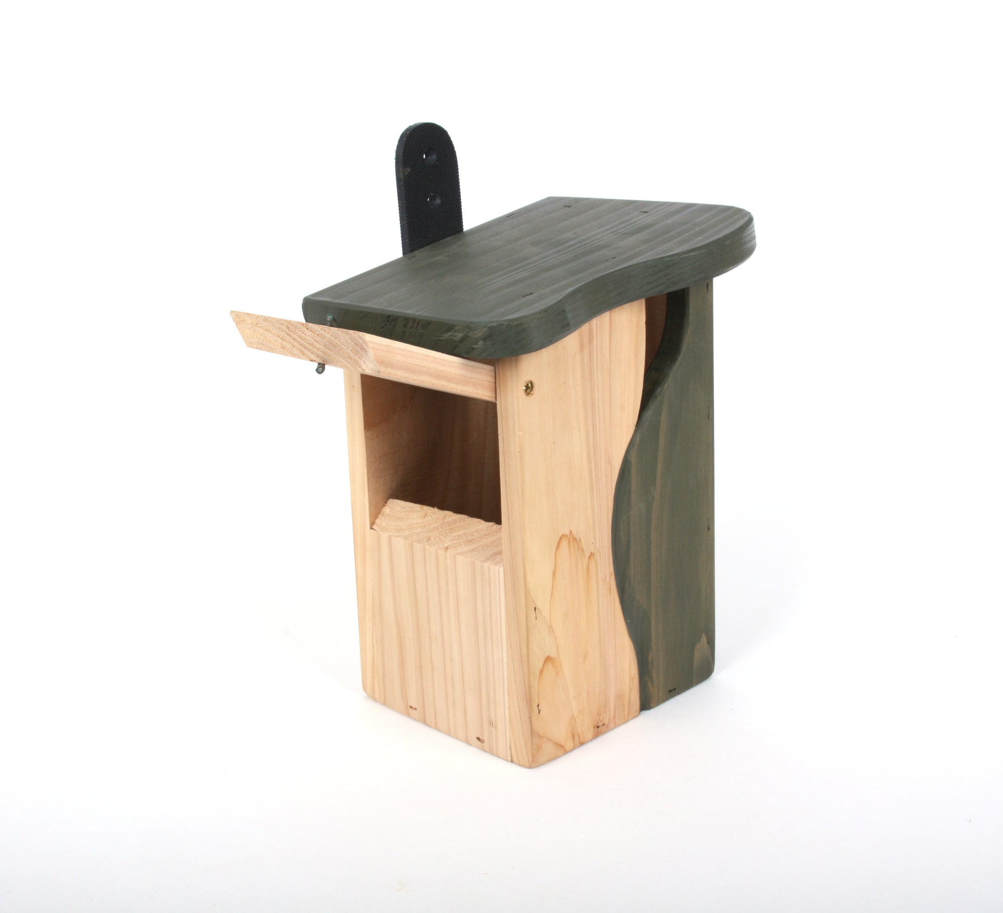 The Wildlife World Curve, Cavity Bird Nest Box by Simon King features a natural wooden finish with green painted sections. It includes a slanted roof, an open side entrance, and a black mounting bracket on the back for hanging. The overall design is simple and functional, mimicking a natural tree hollow to attract small birds with its unique nest box charm.