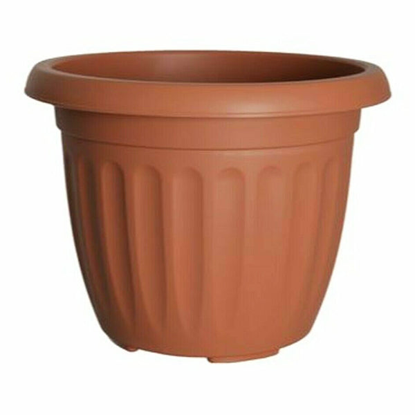 The "Round Ribbed Plastic Planter Terracotta 40cm" is a large, round planter featuring a terracotta hue with a flared rim and vertical ribbed texture. This weather-resistant planter is designed with simplicity and classic style, making it perfect for both indoor and outdoor use.
