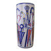 A tall cylindrical ceramic umbrella stand named "Umbrella Stand, Pastel Coloured Umbrellas Design," decorated with pastel umbrella motifs and walking sticks in blue, red, yellow, and gold on a white background.
