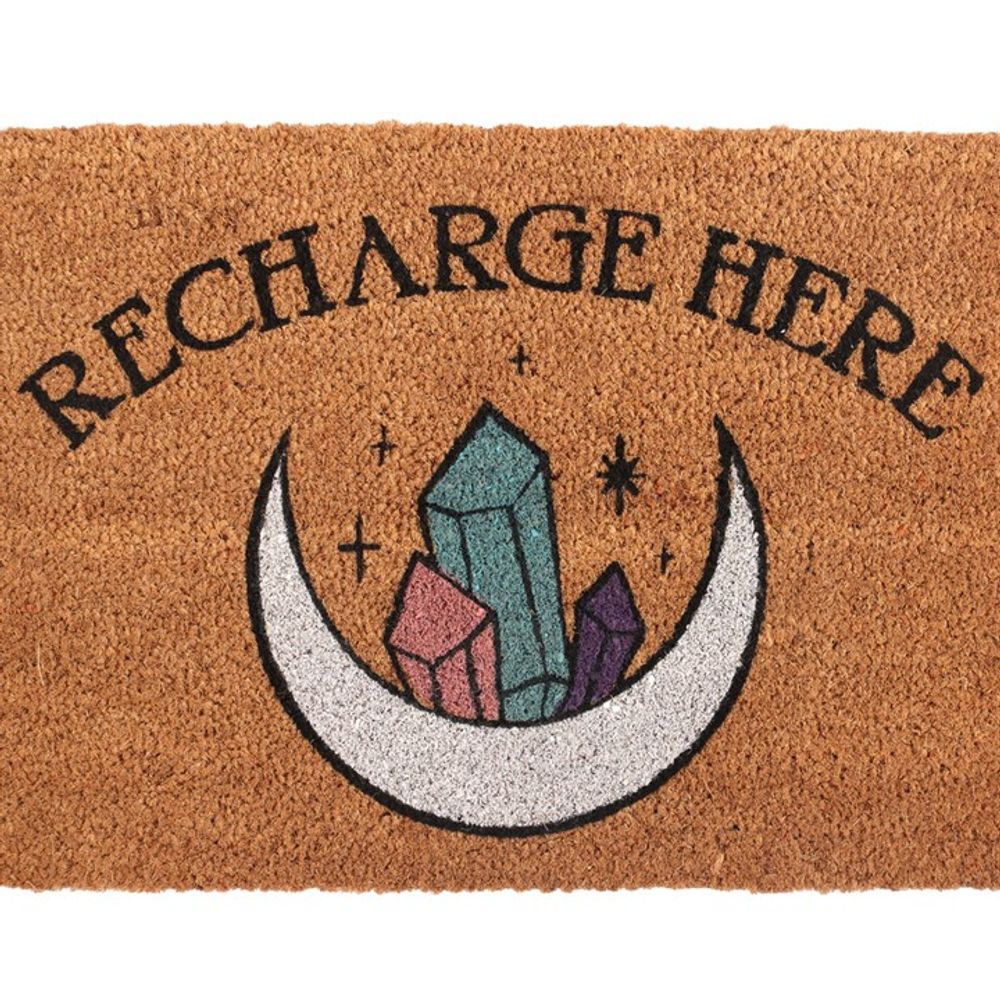 Introducing the Natural Recharge Here Crystal Doormat, a stylish welcome mat with a mystical moon design, adorned with pastel crystals and charming star illustrations. Its textured natural coir finish makes it an ideal choice for greeting guests in style.