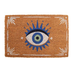 This whimsical home accent, the Natural All Seeing Eye Doormat, features a striking blue iris with radiating blue spikes on a natural brown coir background and white corner designs.