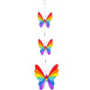 The "String Of Butterflies" features three rainbow-colored butterflies arranged vertically, each one diminishing in size as you move downward. This enchanting mobile, crafted with ethically sourced materials, connects the vibrant butterflies with strings to create a captivating sun catcher display.