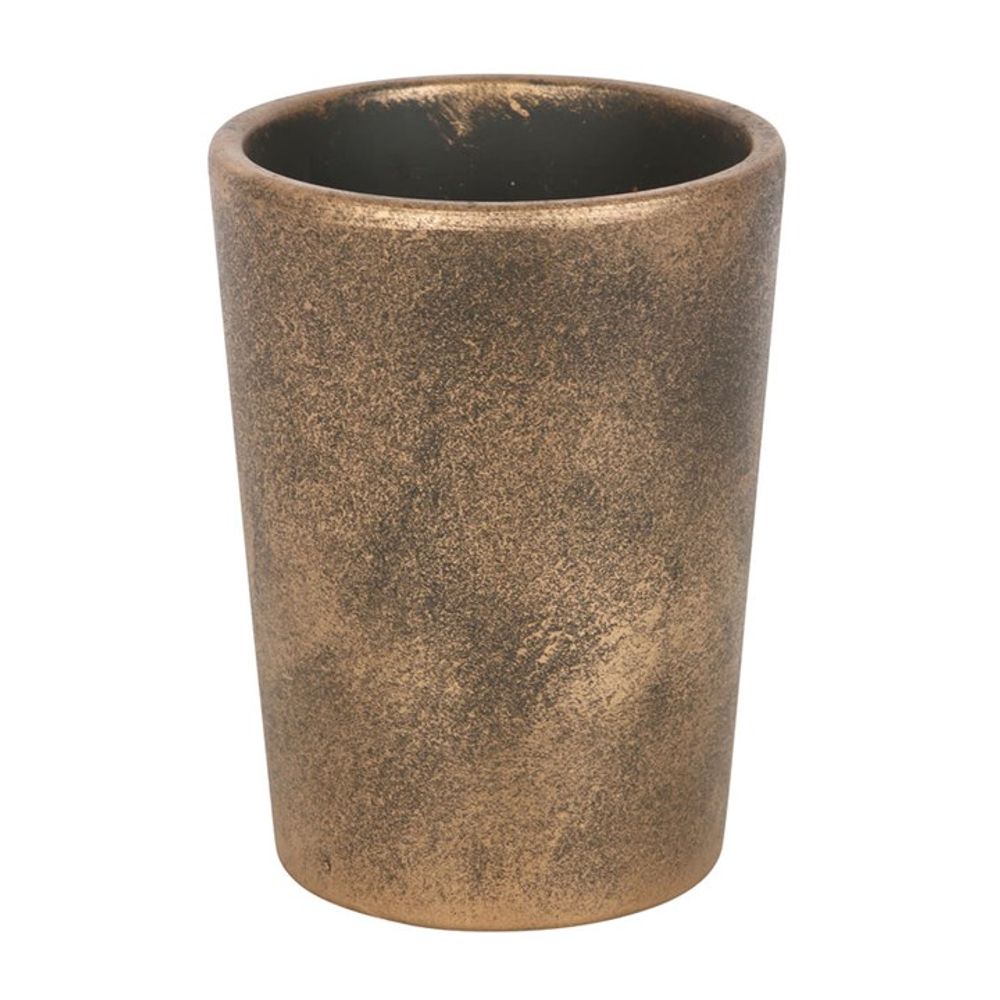 A cylindrical, bronze-colored tumbler with a textured surface. The tumbler boasts a simple, minimalist design reminiscent of the Triple Moon Bronze Terracotta Plant Pot by Lisa Parker, and a uniform color that gives it a rustic yet elegant appearance.