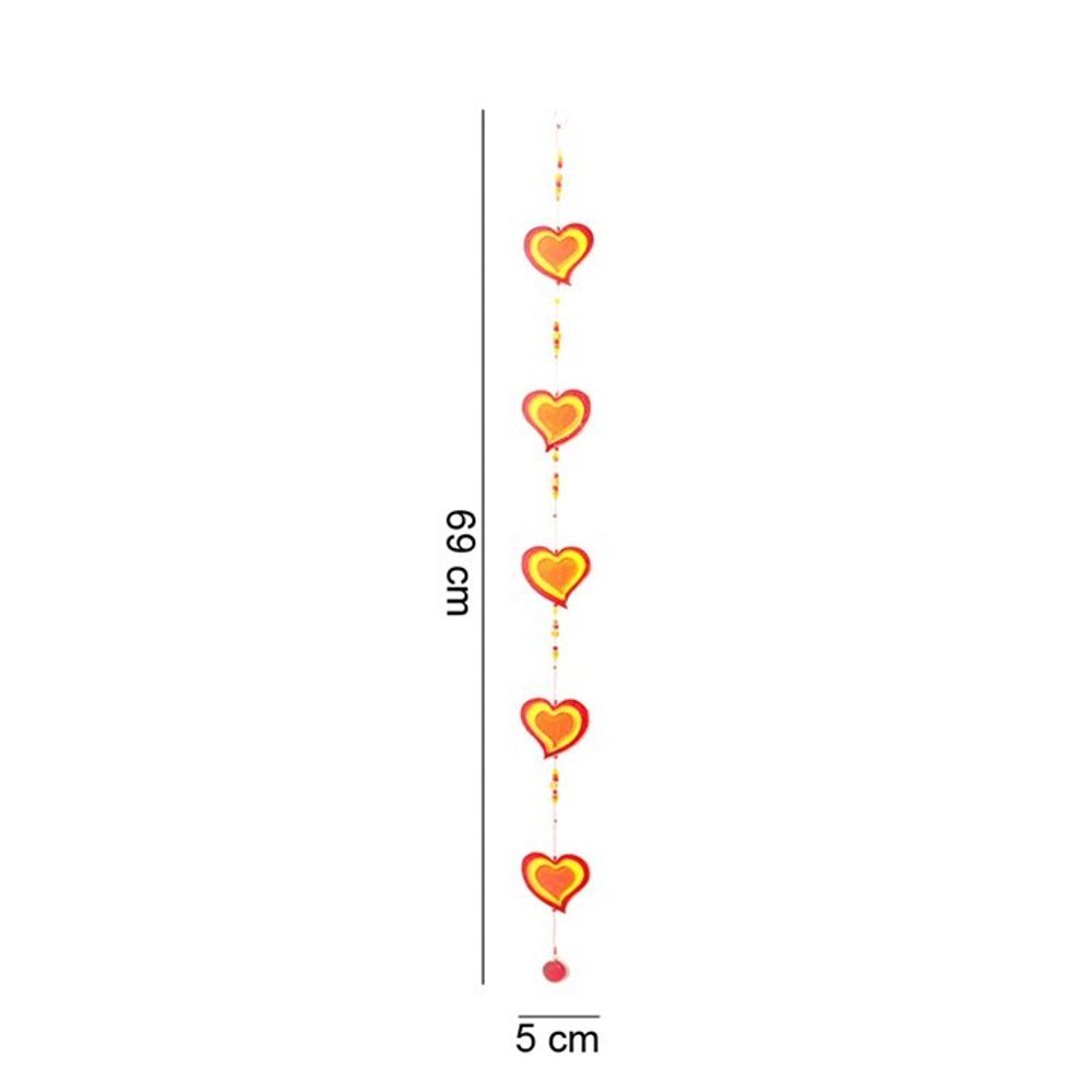 The Red/Yellow String Of Hearts is a 69 cm long suncatcher featuring seven red hearts with yellow centers, evenly spaced and connected by a thin line with small beads, creating an ethically sourced, charming window display.