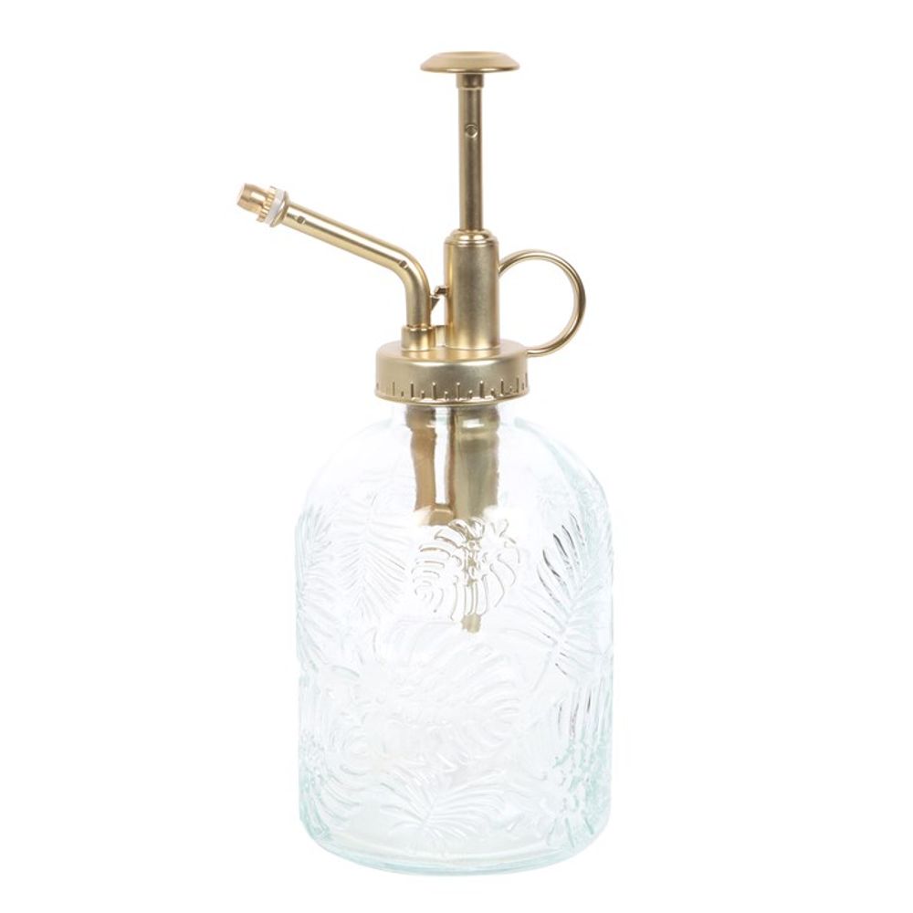 The Large Leaf Print Glass Plant Mister boasts a stunning gold-toned metal pump and nozzle, ideal for enhancing your indoor garden. Its textured glass showcases intricate leaf patterns, offering an elegant addition to your plant care routine.