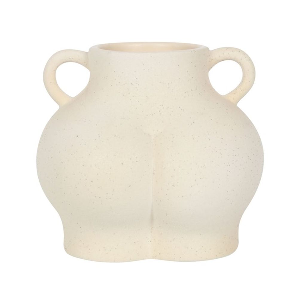 Introducing the Cream Speckle Bum Plant Pot—a cream-colored ceramic vase with a distinctive curvy design and whimsical home decor charm. It features two small handles on each side, and its smooth surface is accented with subtle speckles, offering a minimalist, modern look ideal for dolomite plants.