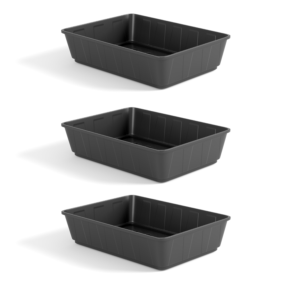 Three identical Heavy Duty Seed or Gravel Trays, made of durable injection-moulded plastic and featuring a smooth surface with slightly slanted sides indented with vertical lines, are stacked in a vertical arrangement. Each black rectangular tray casts a soft shadow to the left, indicating light coming from the right.