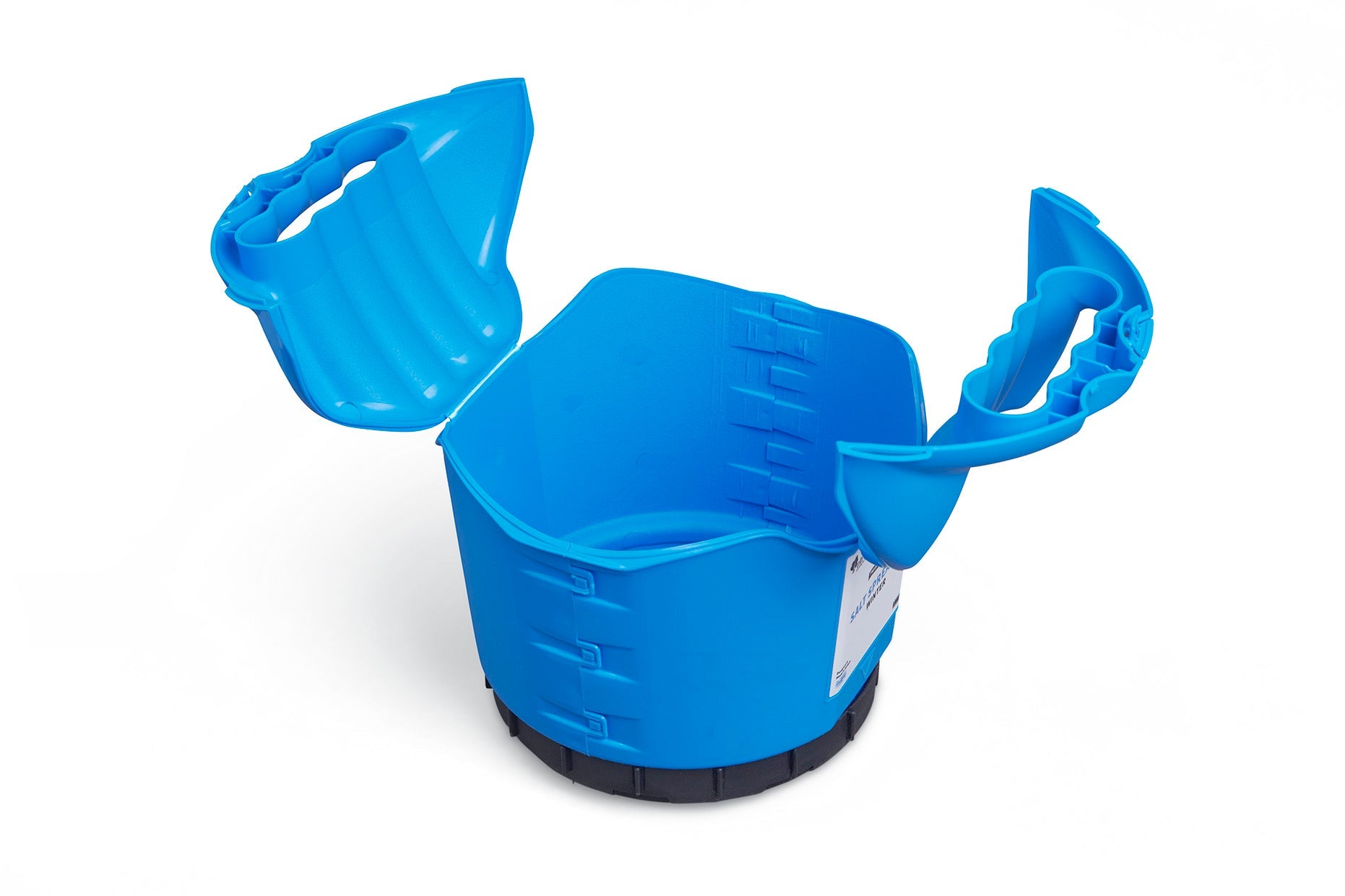 The Winter Plastic Twist & Shake Salt Spreader is an open blue plastic container designed for easy transfer of materials, featuring a scooping mechanism on both sides. It has a 5KG capacity, adjustable to 10 different flow rates, and includes a label on its side. The spreader rests on a black base and the background is plain white.