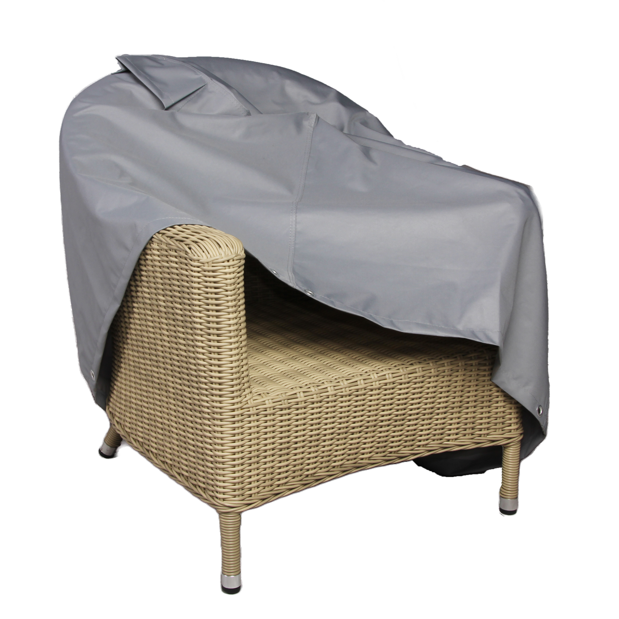 The Premium Modular Armchair Cover envelops a wicker armchair, offering waterproof protection with its UV-protected PVC design. The woven texture subtly shows through the cover, which drapes over the back and seat, leaving black-tipped-legged chair exposed.