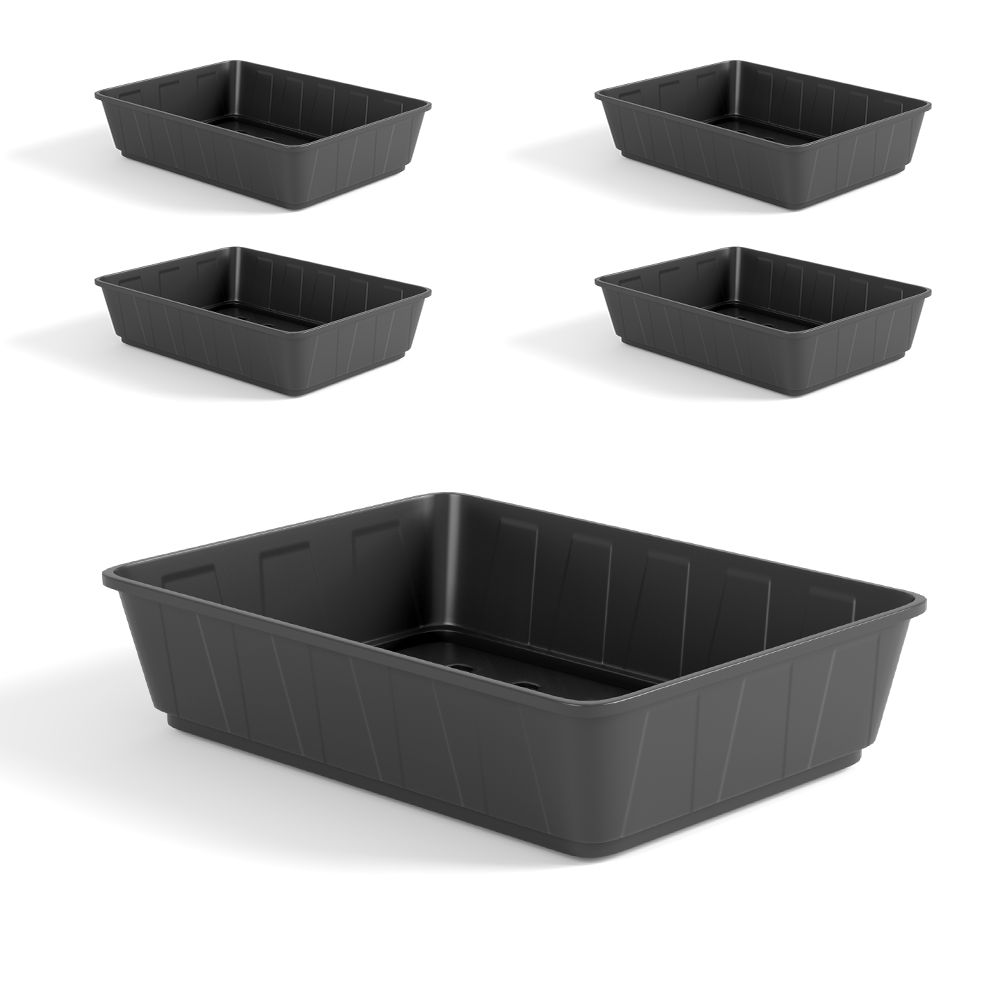 Five black rectangular Heavy Duty Seed or Gravel Trays in various sizes are arranged with one larger tray in front and four smaller ones evenly spaced in the background. Made from durable injection moulded plastic, these versatile gardening trays feature ridged sides and cast soft shadows behind them.