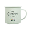 The Gardener's Tea Break Enamel Mug is a light green mug adorned with the phrase "The Gardener's Tea Break," making it ideal for avid gardeners. Below the text, three small botanical illustrations of flower pots add a delightful charm. The mug includes a simple handle on the right side.