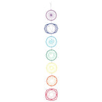 The Chakra Wall Hanging is a vertical decor piece featuring seven rainbow-colored circles, each representing a chakra and spiritual wellbeing, arranged from violet at the top to red at the bottom.