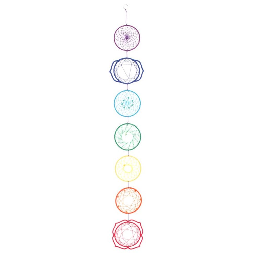 The Chakra Wall Hanging is a vertical decor piece featuring seven rainbow-colored circles, each representing a chakra and spiritual wellbeing, arranged from violet at the top to red at the bottom.