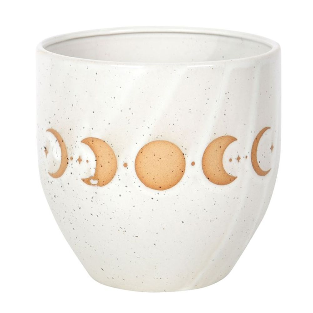 The Moon Phase Plant Pot is a round stoneware pot in speckled white, featuring an eye-catching moon phase design in earthy tones that embodies timeless home decor styles.