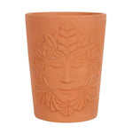 The 16cm Green Goddess Terracotta Plant Pot features an embossed face with stylized leaf motifs, reflecting Mother Earth's serene expression. This natural clay cylindrical planter epitomizes a timeless link to the Green Goddess.