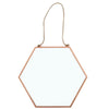 The Large Geometric Mirror, featuring a sizeable hexagonal shape and a slender copper frame with geometric detailing, hangs gracefully from a rope. Displayed against a white background, it highlights its minimalist design while serving as an eye-catching piece of home decor.