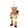 The Terracotta Pot Man Planter brings charm to any garden decor with its smiling face, botanical hairstyle, green scarf, and yellow apron. It has jointed arms and legs featuring black shoes and holds a miniature shovel. Ideal for hanging in your outdoor space using its attached string.