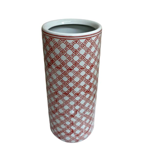 The Red and White Daisy Chain Umbrella Stand is a tall, cylindrical ceramic piece with a smooth finish, featuring a bold geometric red lattice pattern on white—perfect as a striking hallway umbrella holder.
