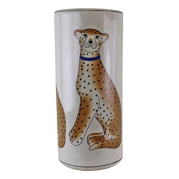 The Ceramic Umbrella Stand, Leopard Design, is a tall, cylindrical ceramic piece featuring a painted smiling leopard with black spots, a blue collar, and a relaxed pose.