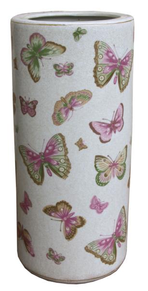 The Ceramic Umbrella Stand, Butterfly Design, is a tall, cylindrical white ceramic stand decorated with pink and green butterflies in different sizes and poses.