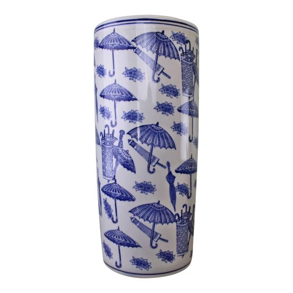 The Umbrella Stand, Vintage Blue & White Umbrella Design, is a tall ceramic piece with a vintage blue and white pattern depicting umbrellas, turtles, and umbrella holders on a white background.