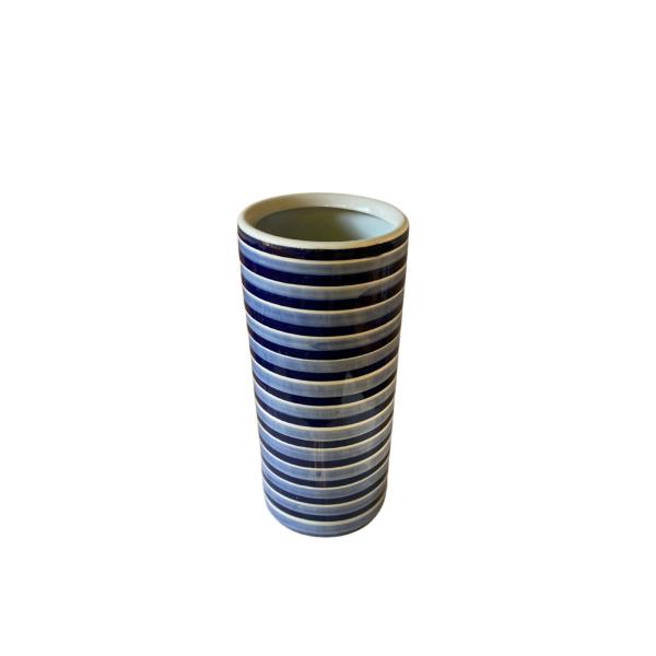 The Horizontal Striped Umbrella Stand is a tall, cylindrical ceramic vase with navy blue and white horizontal stripes, ideal for use as a hallway umbrella holder, shown against a plain white background.