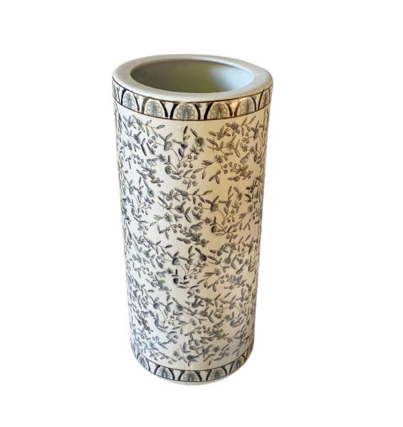 The Blue And White Ditsy Print Umbrella Stand is a tall ceramic cylinder featuring a delicate blue floral pattern—ideal for charming hallway decor.