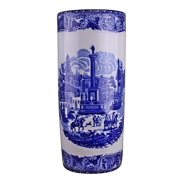 The Umbrella Stand, Vintage Blue & White Townscape Design, features intricate blue and white patterns with classical buildings, columns, and figures, creating a detailed and elegant townscape motif.