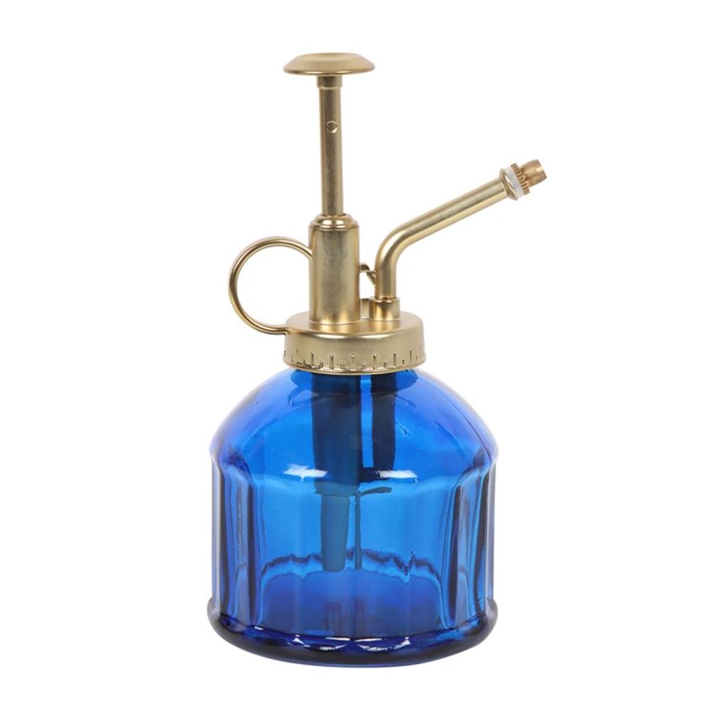 The Small Blue Glass Plant Mister offers a vintage aesthetic with its brass pump and nozzle. Ideal for indoor garden enthusiasts, it features a round handle and ribbed texture on the body.