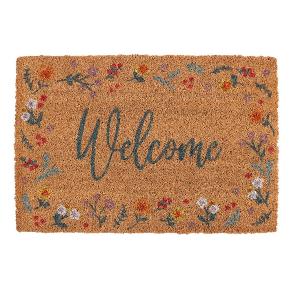 The Natural Botanical Welcome Doormat is a rectangular natural coir mat featuring the word "Welcome" in dark blue cursive font, bordered with colorful flowers and green leaves. The cheerful botanical design enhances the natural, brown coir texture, creating an inviting and charming appearance.