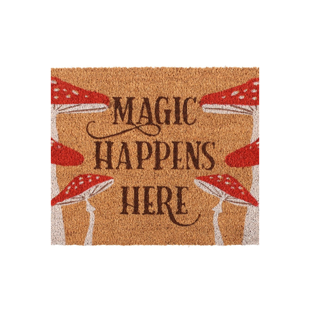 The Natural Magic Happens Here Mushroom Doormat features red and white border mushrooms, exuding magical charm with its bold "MAGIC HAPPENS HERE" message.