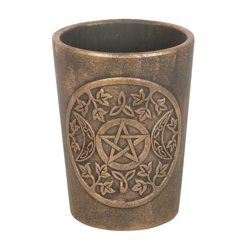 The Triple Moon Bronze Terracotta Plant Pot by Lisa Parker is a bronze-colored, cylindrical pot featuring an engraved pentagram encircled by ivy leaves and crescent moons. The intricate design, characteristic of Lisa Parker's work, imbues the pot with a mystical and ancient aura, perfect for both ritualistic and decorative uses.