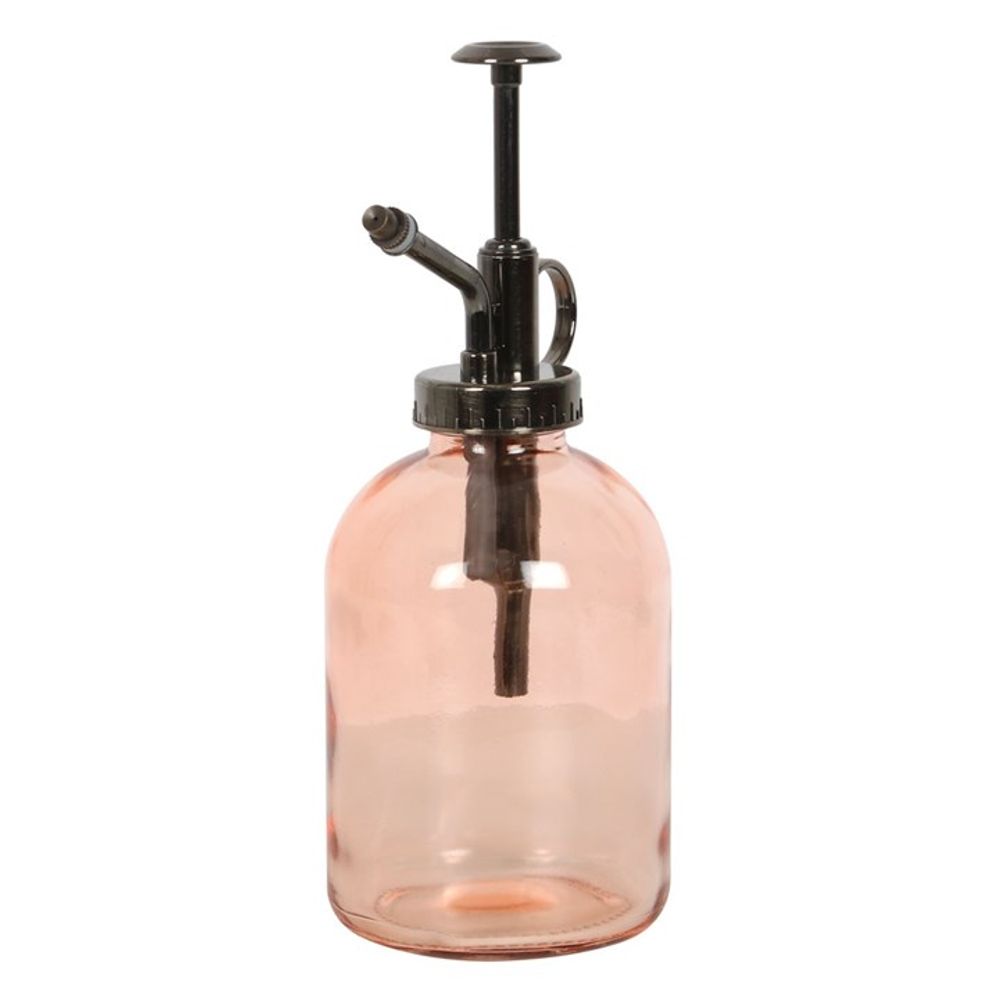 The Pink Minimalist Glass Plant Mister, featuring a round clear pink glass body and a black metal nozzle and pump, stands against a white background. Its vintage design makes it an elegant home accessory, ideal for any indoor garden.