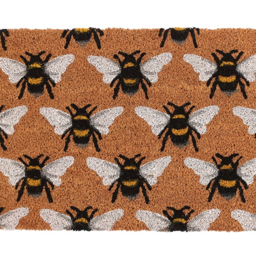 The Natural Bee Print Doormat features a rectangular design with an all-over print of black and yellow bees with white wings on a brown background. The bees are uniformly spaced in rows, all oriented in the same direction, making it perfect for indoor use.