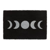 The Black Moon Phase Doormat, with its mystical touch, features white crescent moon phases symmetrically arranged around a full moon in the center. This enchanting doormat showcases the phases in a decreasing and then increasing sequence from left to right.