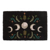 The Black Dark Forest Moon Phase Doormat features an enchanting design with a mystical moon phase, highlighting a full moon at its center bordered by waxing and waning crescent moons. The charming leafy floral patterns in green and orange stand out against the black background.