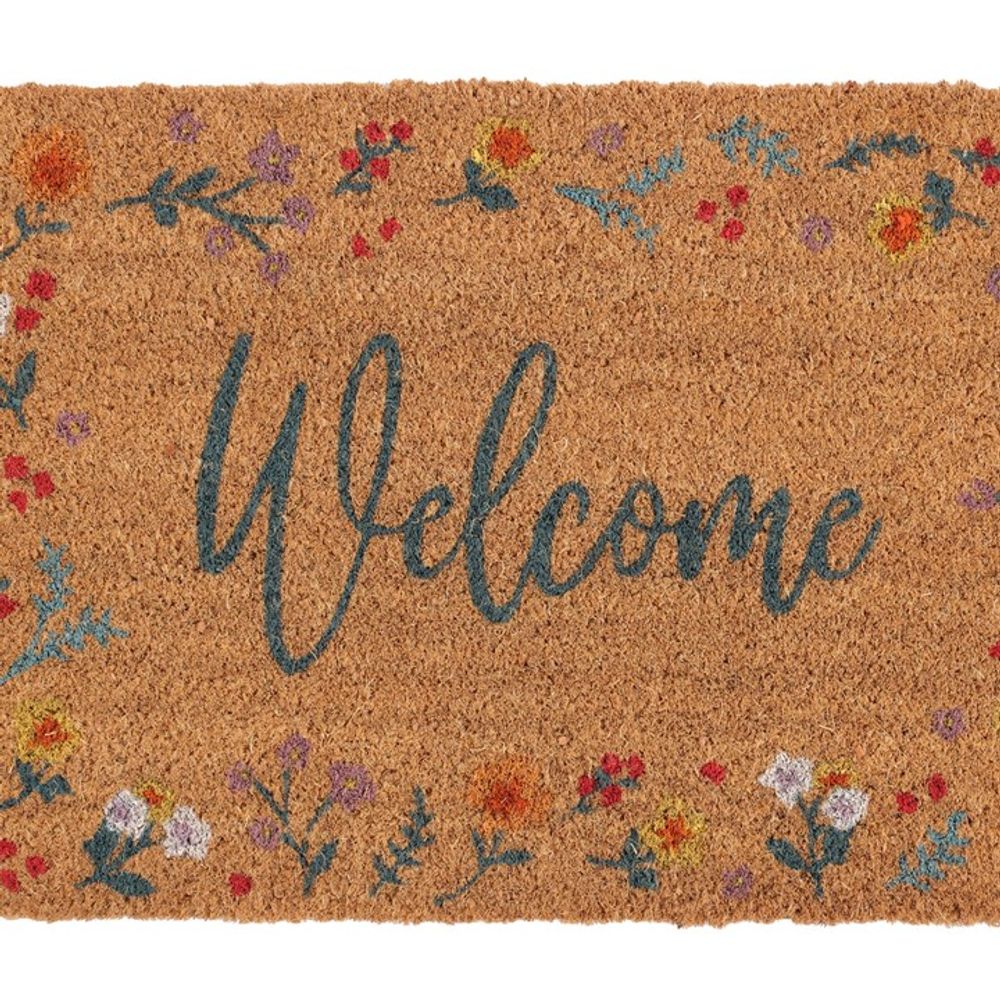 The Natural Botanical Welcome Doormat is a rectangular mat made of natural coir, featuring the word "Welcome" written in cursive blue letters in the center. The border is adorned with colorful botanical prints, including red, purple, orange, and white flowers.