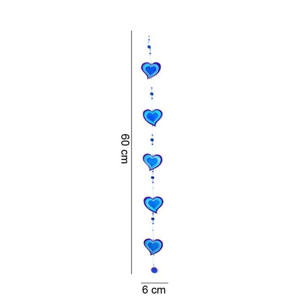 This string of hearts suncatcher, known as the "Purple & Blue String Of Hearts," is ethically sourced and showcases a captivating array of seven blue hearts alongside blue beads. It gracefully hangs at a length of 60 cm and measures 6 cm in width, making it an ideal addition to your window decor. The hearts are evenly spaced along the string to enhance its charm.