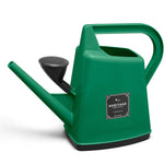 A grass green plastic watering can with a long spout, a black detachable rose, and a large handle. The body has a label that reads "Etree British Heritage," indicating its 1-gallon capacity. British-made for sustainable gardening, the base of the can is black.