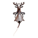 The Rustic Cast Iron Wall Bell, Reindeer Bust, features a reindeer design atop a decorative frame with outward antlers, and a rope-attached clapper. Its weathered cast iron finish adds rustic charm.