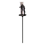 The Cast Iron and Glass Garden Rain Gauge, Frog On Lily Pad features a durable cast iron frog design. A transparent gauge is mounted on a stake, resembling a playful frog climbing up the marked cylinder for accurate rainfall measurement.