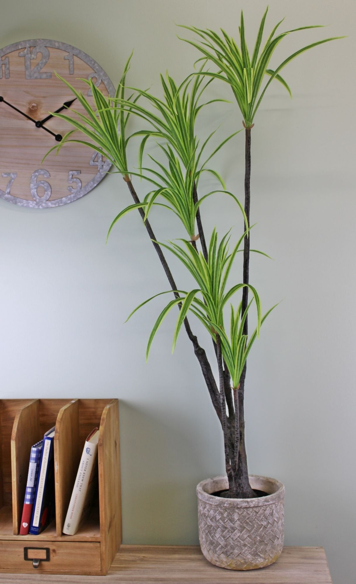 Artificial Dracaena Marginata tree, 120cm tall shown in a living room.