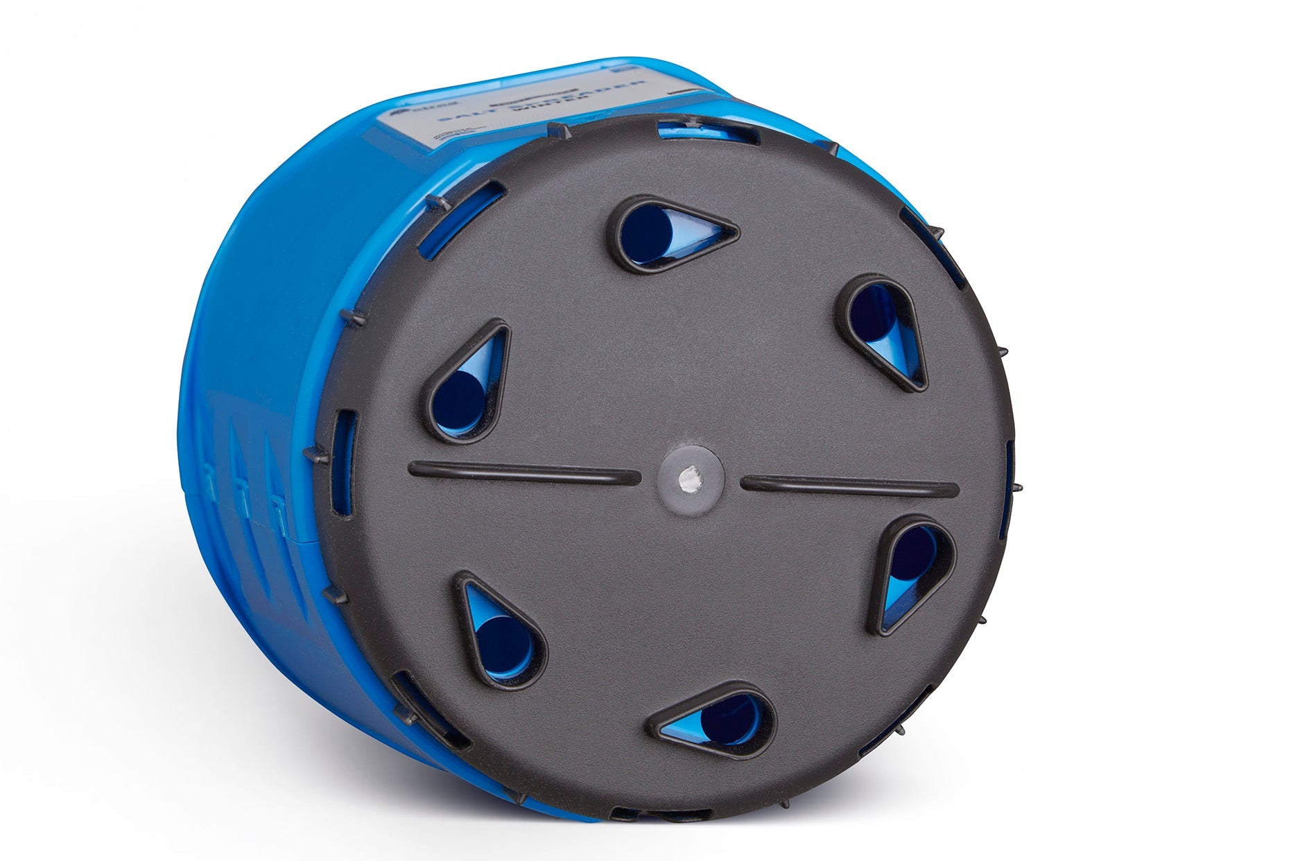 A cylindrical blue Winter Plastic Twist & Shake Salt Spreader with a 5kg capacity, featuring a flat, round black lid with multiple triangular openings around the edge. The spreader is positioned upright, showcasing its adjustable flow rate feature on the lid, and part of its label is visible on the side.