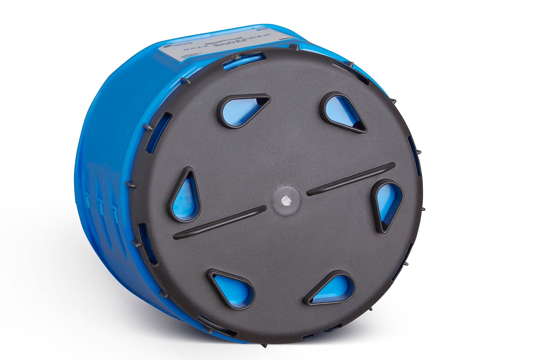 A close-up view of the Winter Plastic Twist & Shake Salt Spreader, featuring a blue cylindrical container with a black lid. The lid has triangular and teardrop-shaped openings that reveal the blue interior. With a 5KG capacity and 10 adjustable flow rates, the spreader is placed on a white background, with its label partially visible on the side.