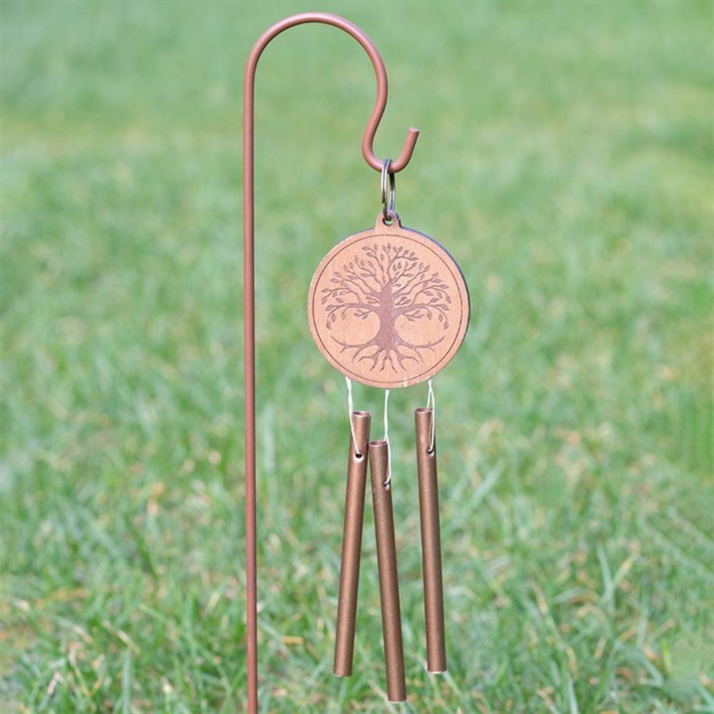 Wind chime shown mounted in a garden