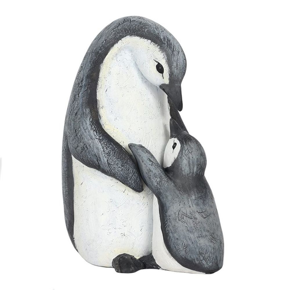 The Mum Waddle I Do Without You Penguin Ornament beautifully captures a tender embrace between two penguins, evoking the warmth of a mother and child. The larger penguin lovingly leans its head down toward the smaller one, making it an ideal gift for any occasion.