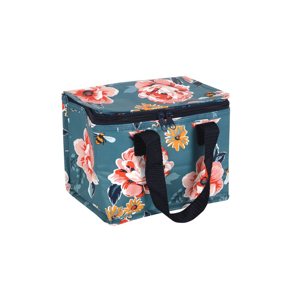 The Bee-utiful Floral Lunch Bag is a rectangular, insulated lunch bag crafted from recycled plastic. It features a dark teal background adorned with large pink and red flowers and green leaves. The bag includes a black zipper on top and has two sturdy black handles for easy carrying.